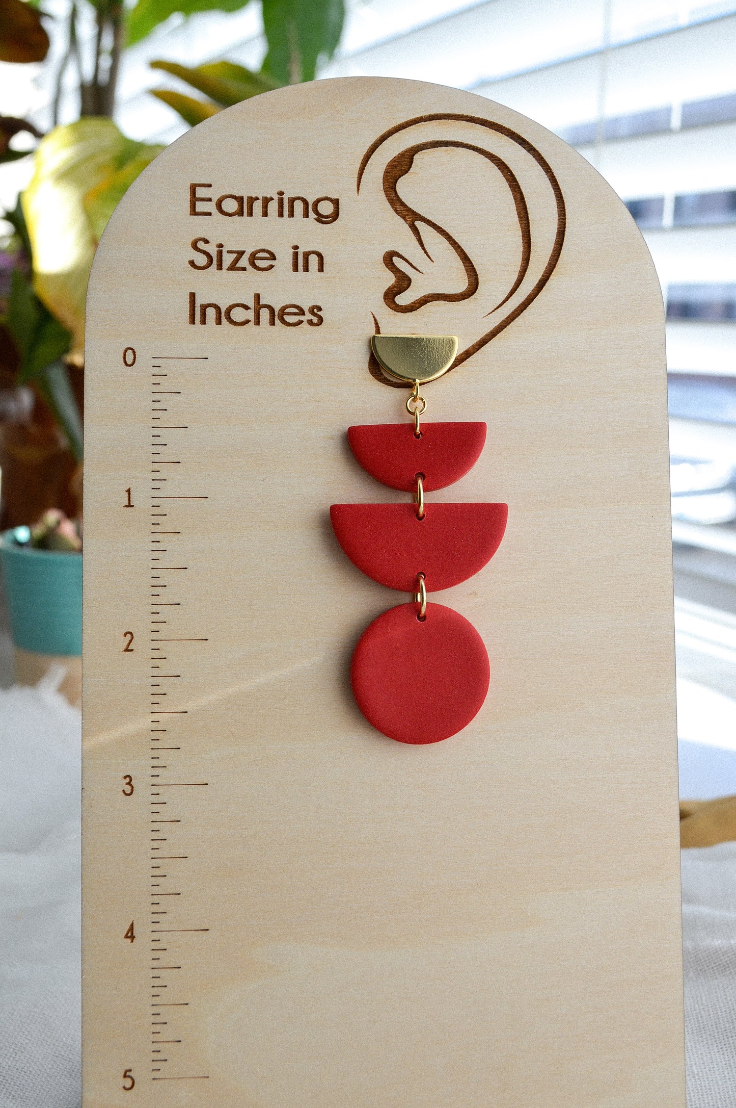 Red half circle dangle statement earrings