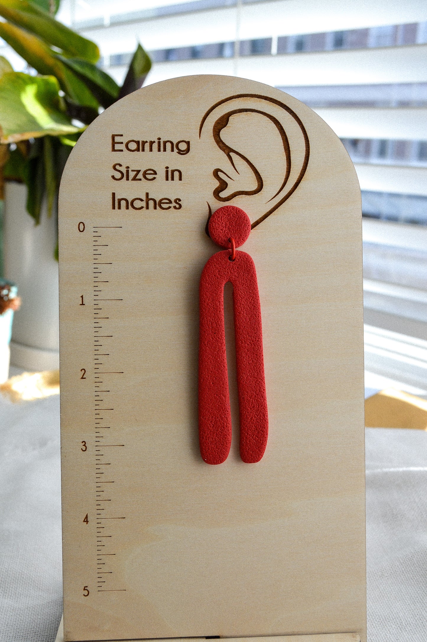 Long organic arch earrings