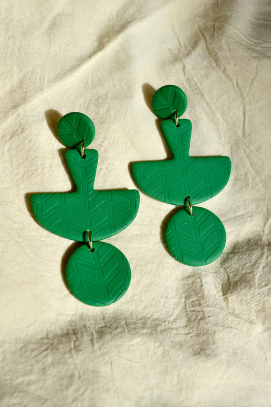 Green textured statement earrings